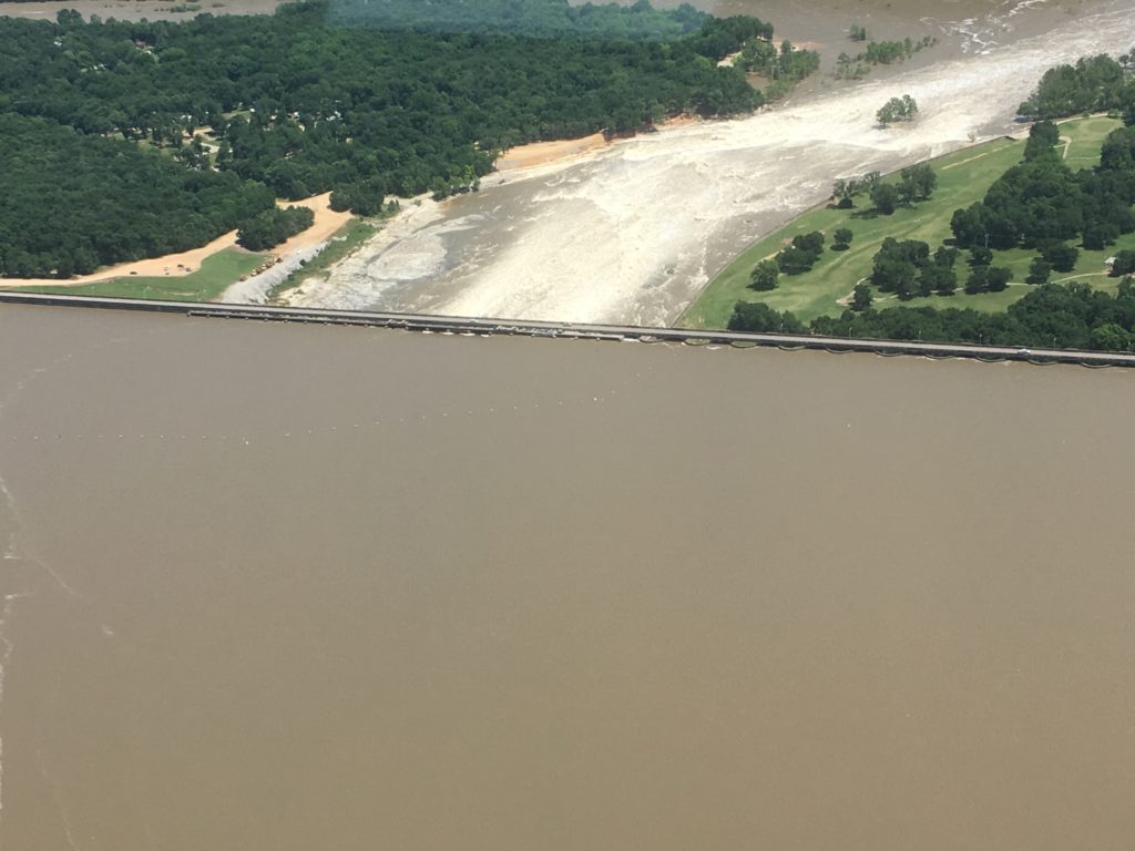 flooded pensacola dam